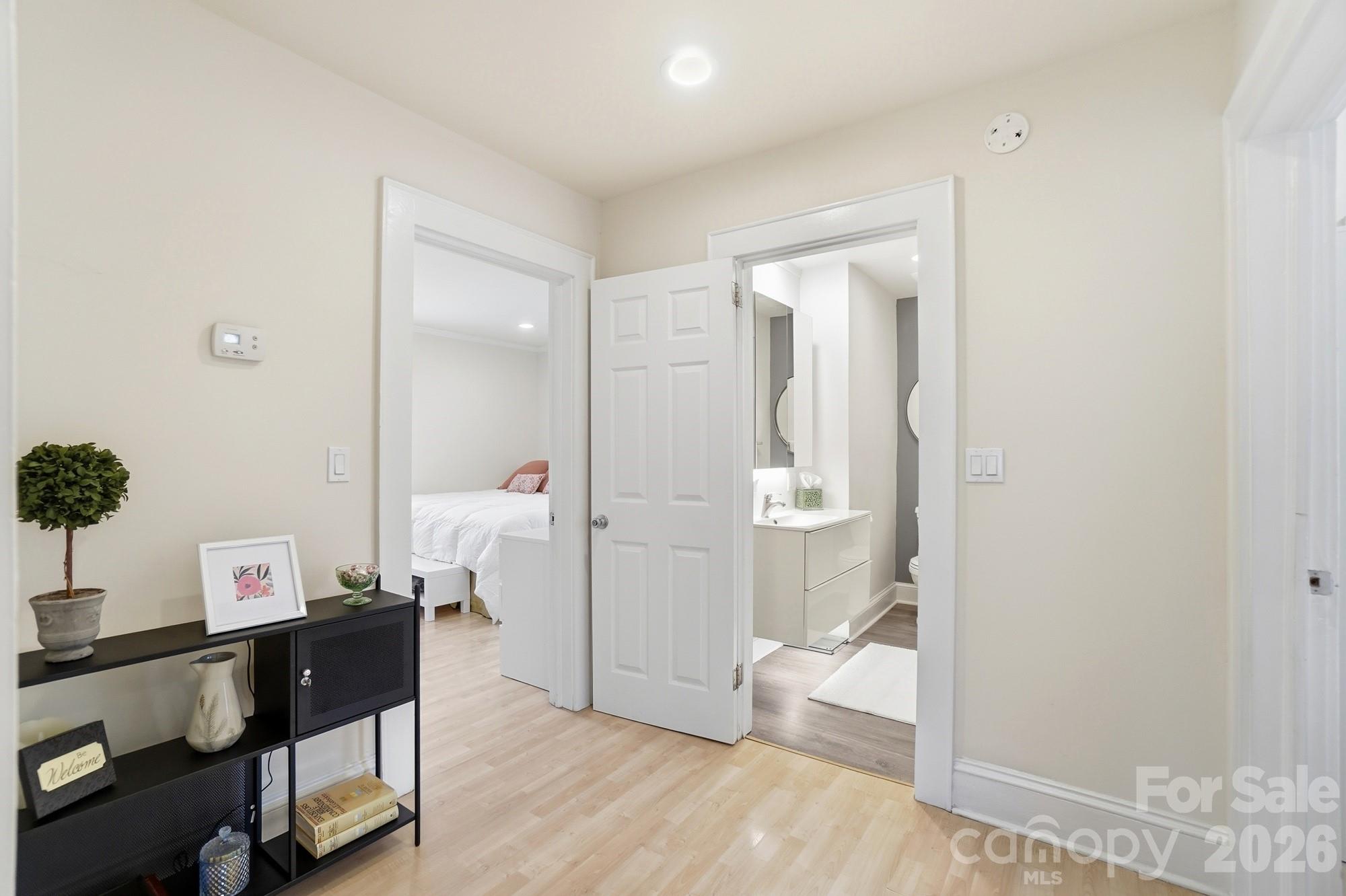406 North Thompson Street Monroe, NC 28112 - Photo 15 of 24 a living room with furniture and wooden floor