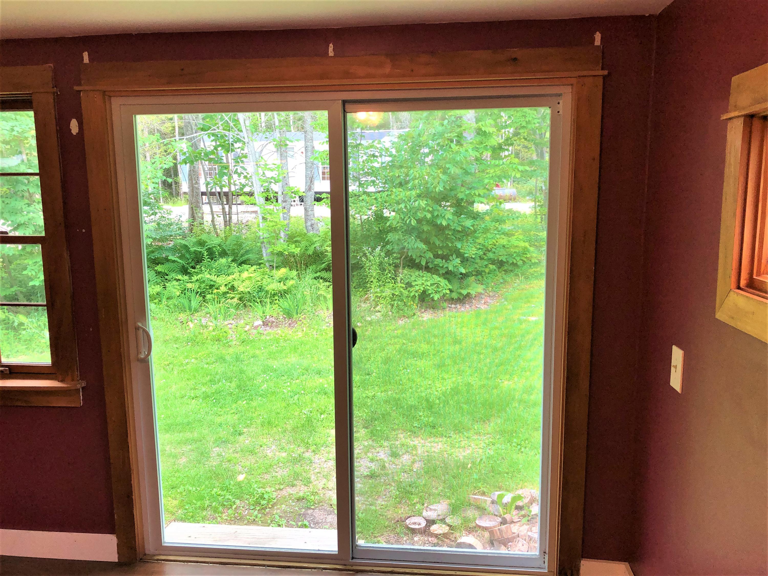 8 Whitmore Road Ellsworth, ME 04605 - Photo 10 of 13 Sliding glass doors in dining room