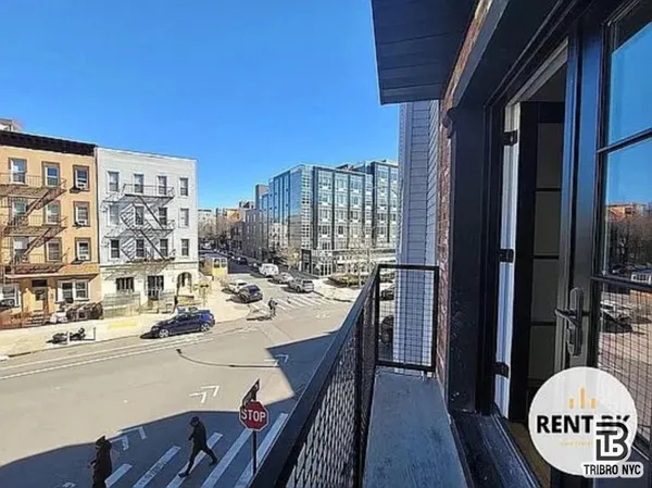 a view of a balcony with chairs