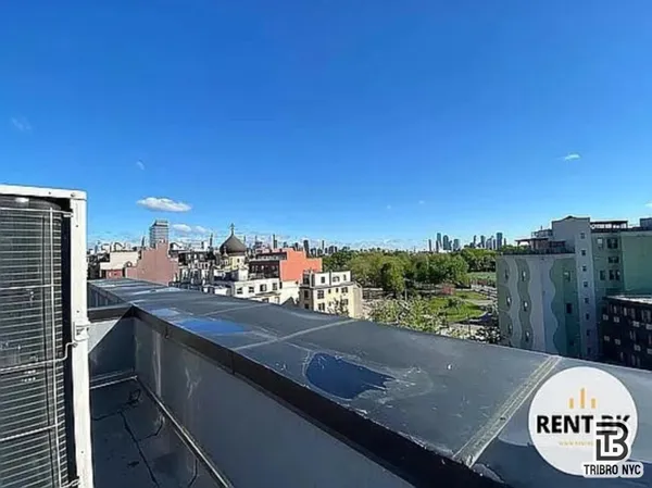 a view of a city from a balcony
