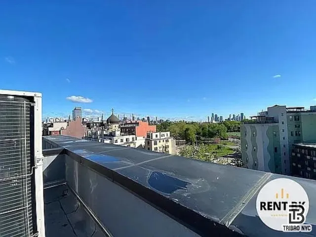 a view of a city from a balcony