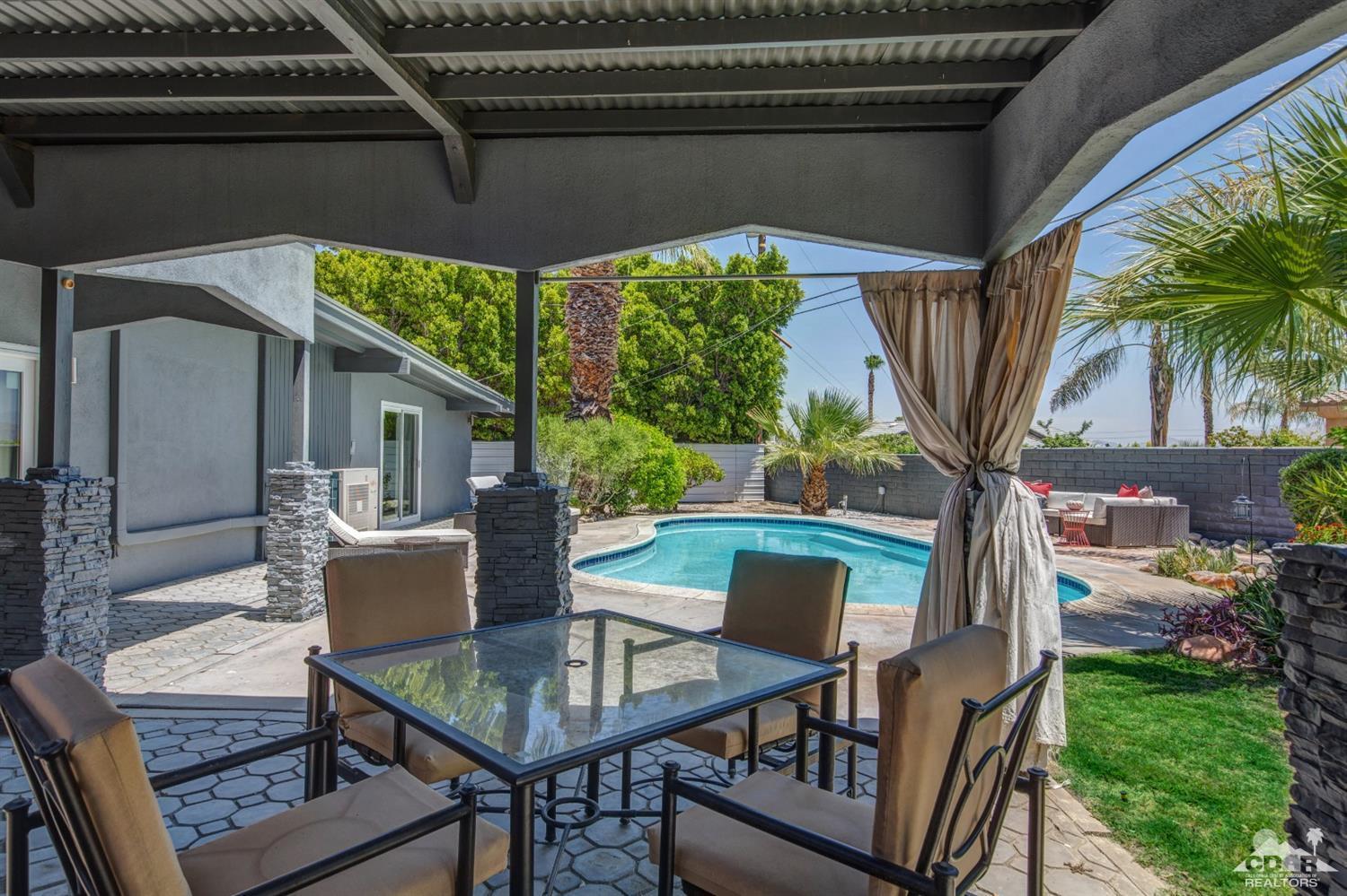 1950 North Magnolia Road Palm Springs, CA 92262 - Photo 25 of 36 a view of yard from deck with patio