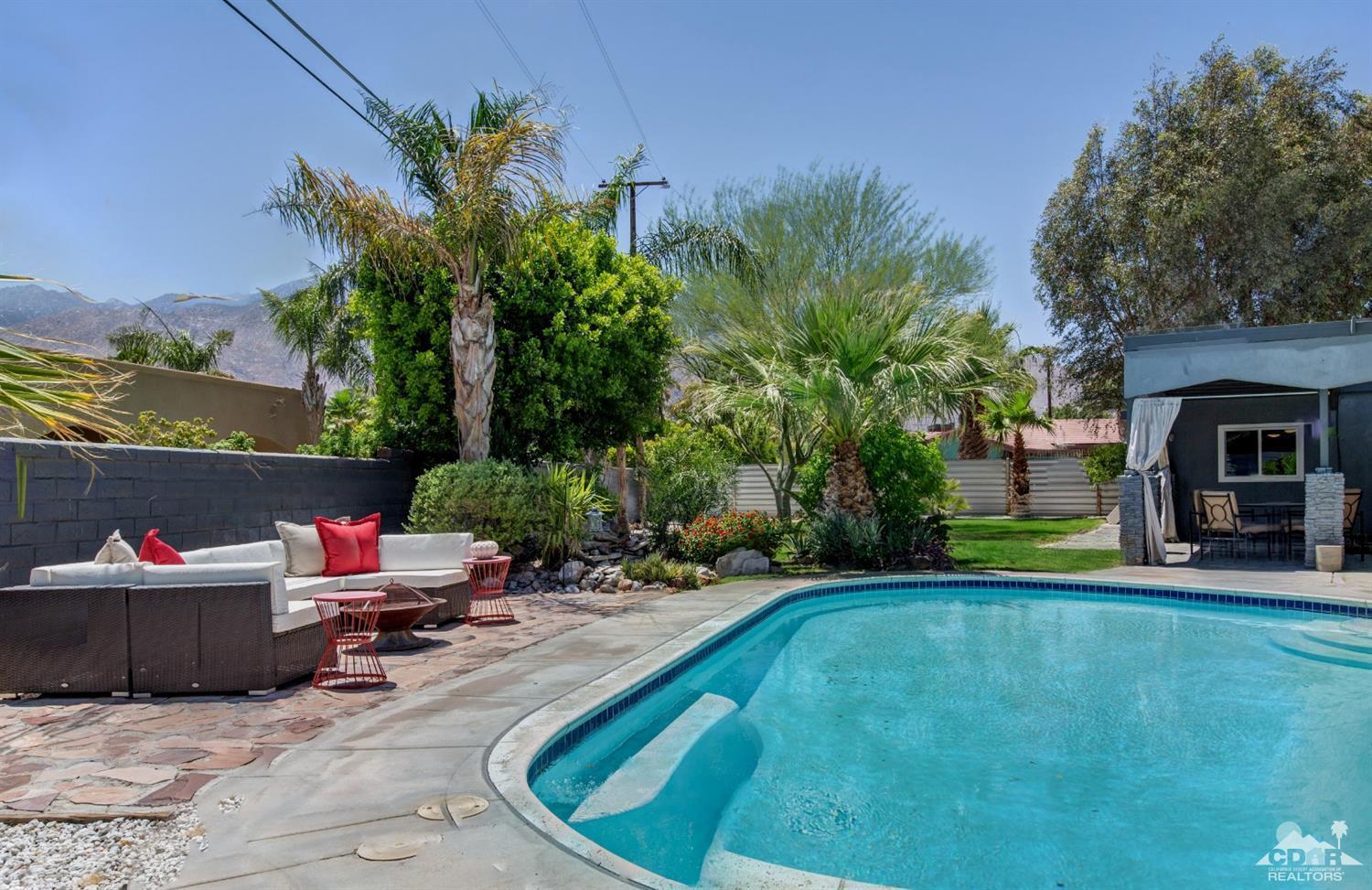 1950 North Magnolia Road Palm Springs, CA 92262 - Photo 30 of 36 a view of a backyard with sitting area and furniture