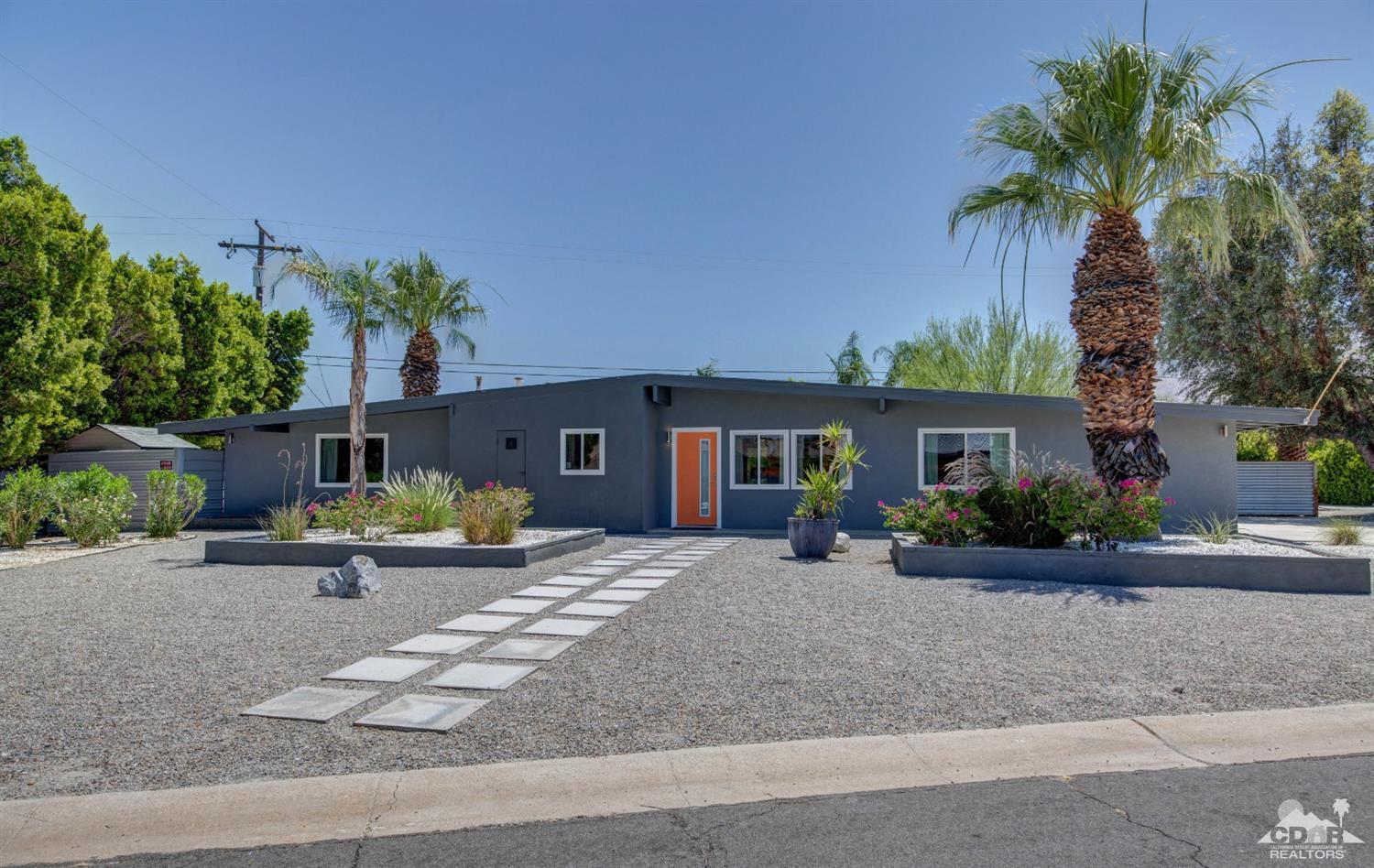 1950 North Magnolia Road Palm Springs, CA 92262 - Photo 4 of 36 a front view of a house with garden