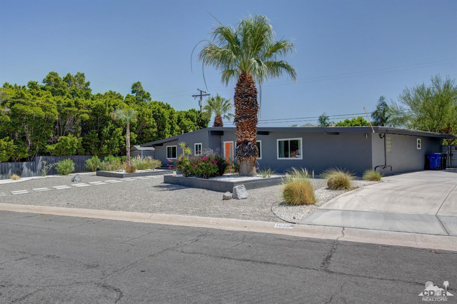 1950 North Magnolia Road Palm Springs, CA 92262 - Photo 31 of 36 front view of a house with a street