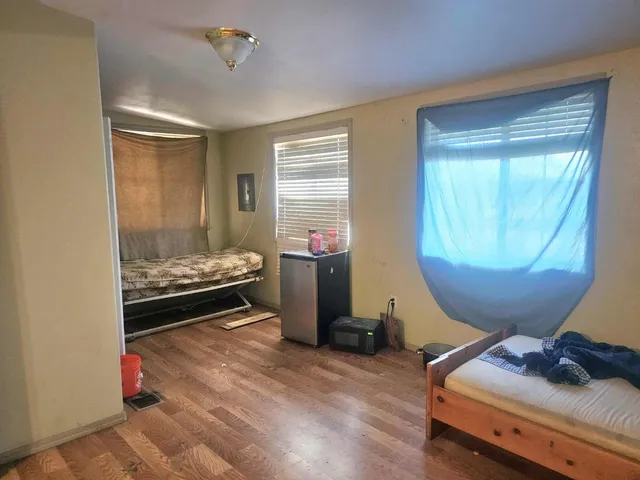 a room with furniture and a window