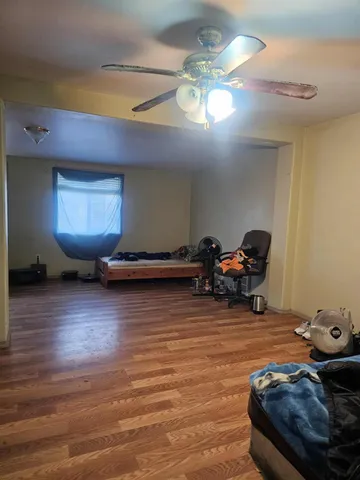 a view of a livingroom with furniture and a chandelier