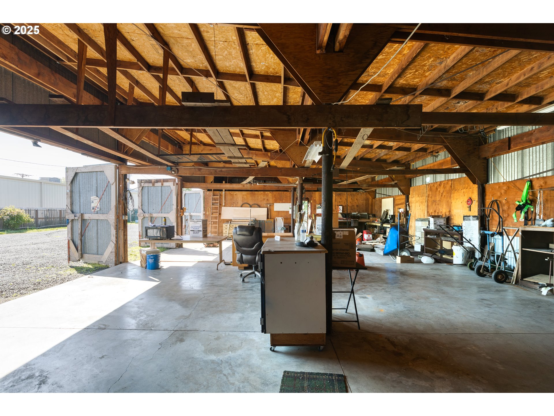 151 1st Street Yoncalla, OR 97499 - Photo 46 of 48 a view of a patio with table and chairs and potted plants