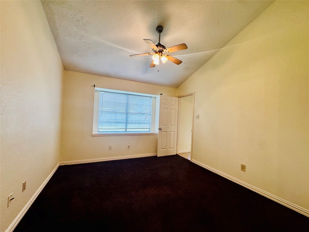 17118 Amber Ridge Drive Sugar Land, TX 77498 - Photo 16 of 20 a view of an empty room with a window
