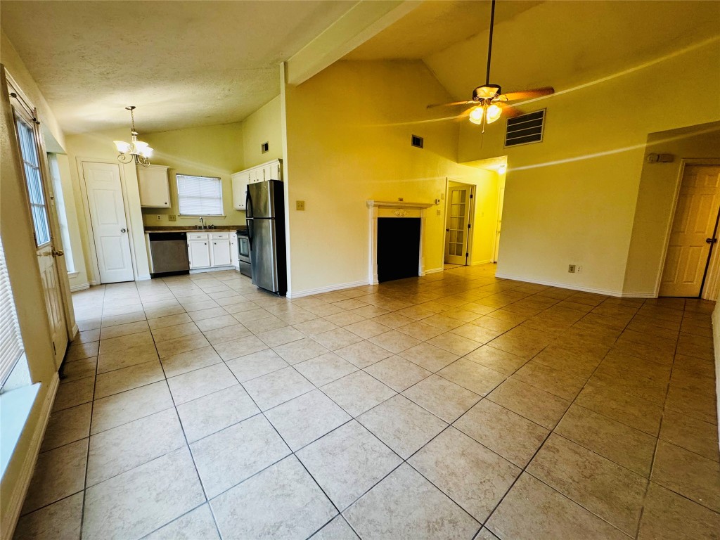 17118 Amber Ridge Drive Sugar Land, TX 77498 - Photo 4 of 20 a view of a livingroom with a furniture and a ceiling fan