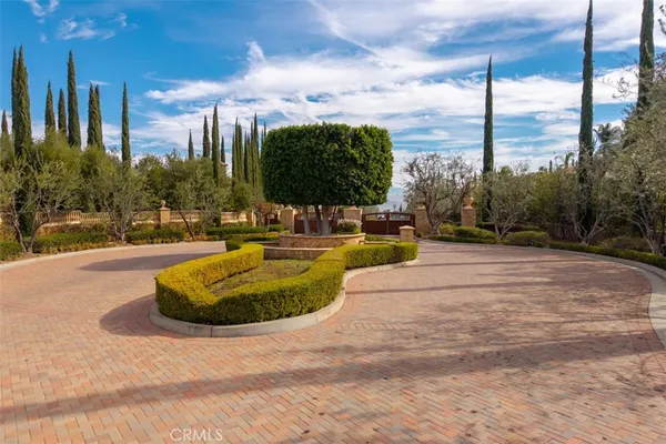 a swimming pool with outdoor seating and yard