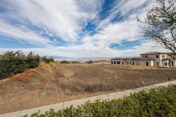 a view of a lake with a big yard