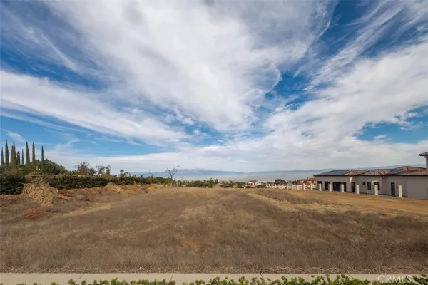 an aerial view of residential houses and outdoor space