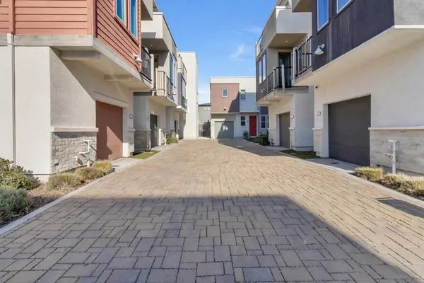 a view of a street with buildings