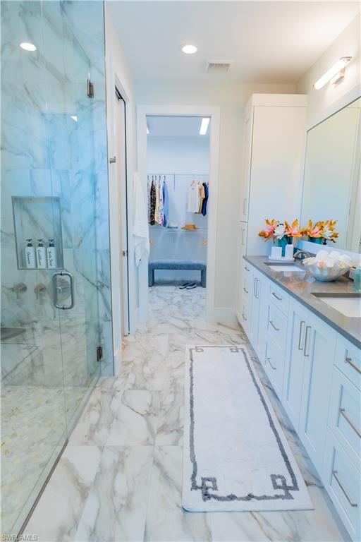 548 101st Avenue North Naples, FL 34108 - Photo 21 of 50 a view of bathroom with shower