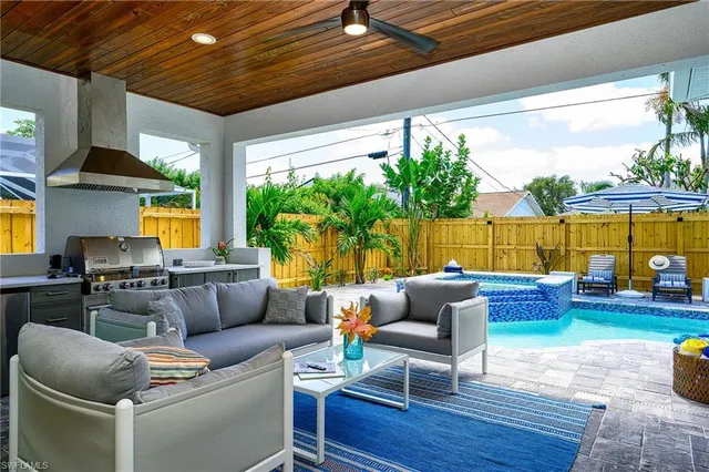 a outdoor living space with furniture and garden view
