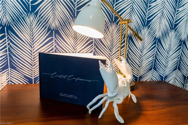 a view of a livingroom with furniture and a window