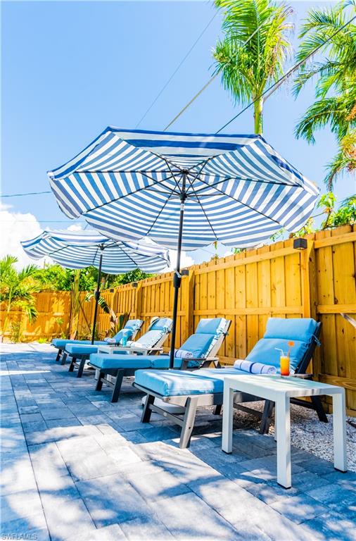 548 101st Avenue North Naples, FL 34108 - Photo 48 of 50 a view of outdoor space with seating