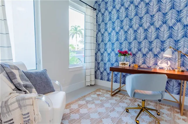 view of entryway with flower in front of main door