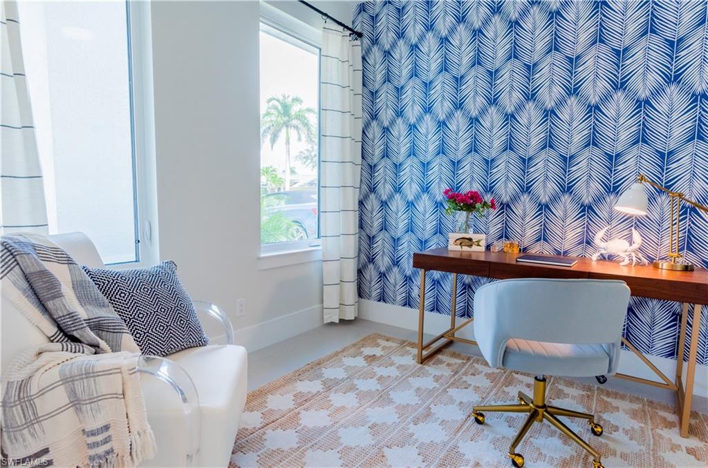 548 101st Avenue North Naples, FL 34108 - Photo 5 of 50 a view of a livingroom with furniture and a window