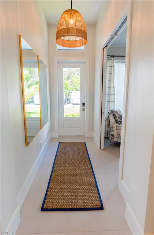 548 101st Avenue North Naples, FL 34108 - Photo 7 of 50 a room with window and mirror