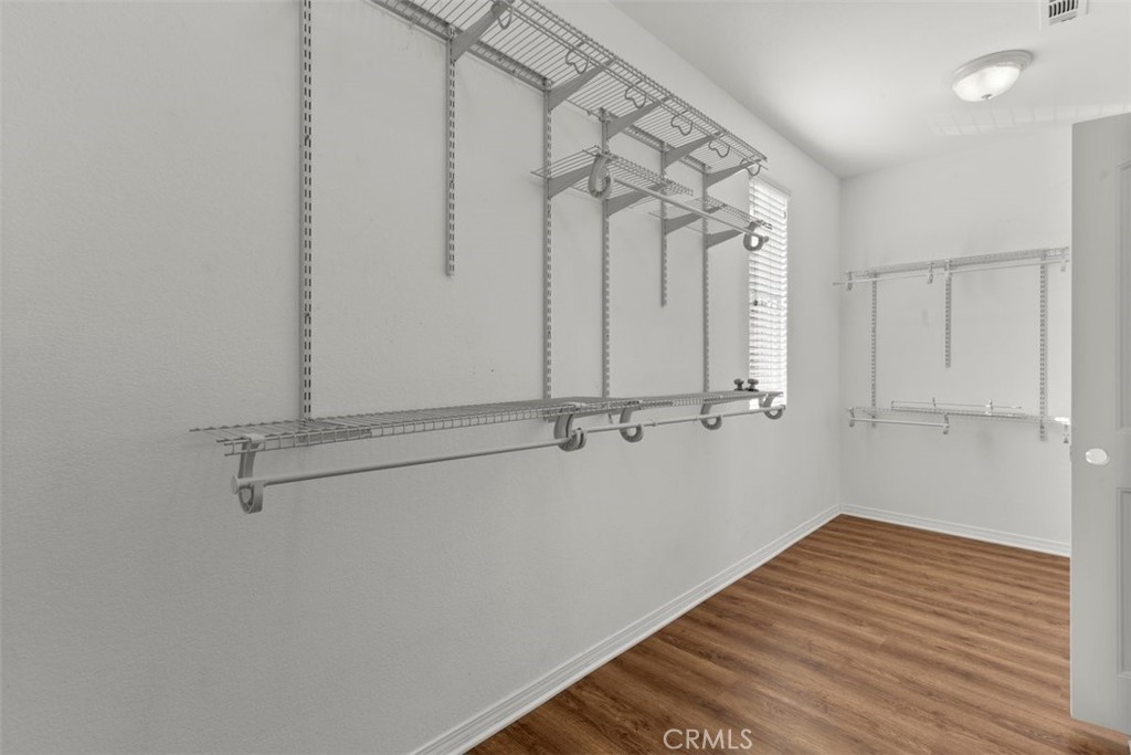 820 Volande Court Perris, CA 92571 - Photo 23 of 37 a view of a room with wooden floor