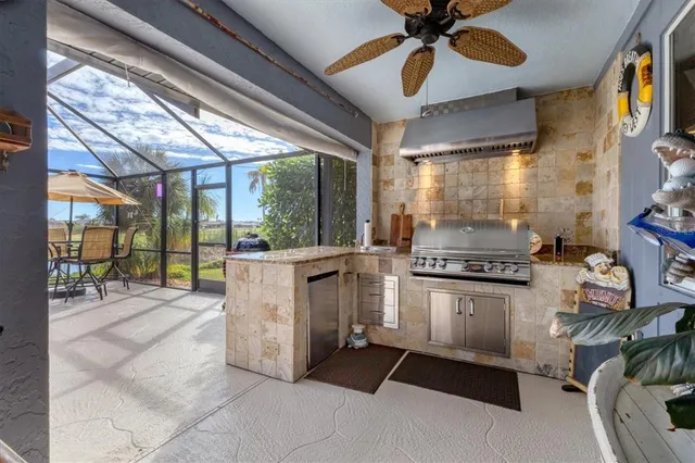 a view of chairs and table in the patio