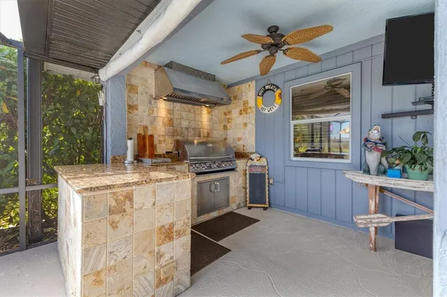 a spacious bedroom with a bed and glass window