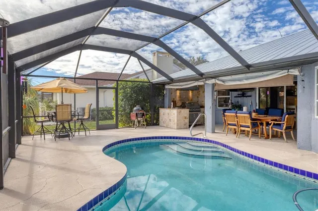 a bathroom with a sink mirror toilet and shower