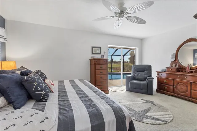 a view of a house with backyard porch and sitting area