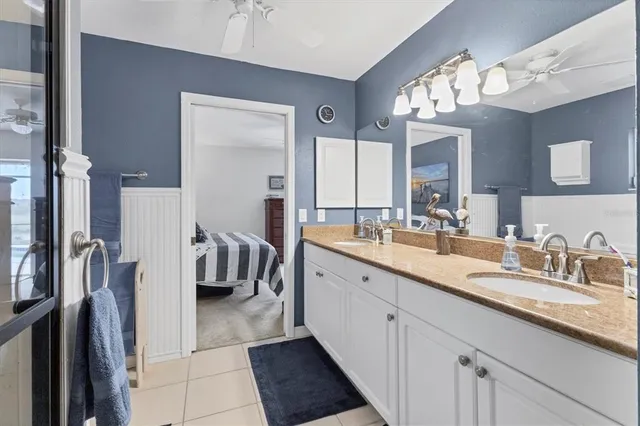 a view of a lake with houses in the back