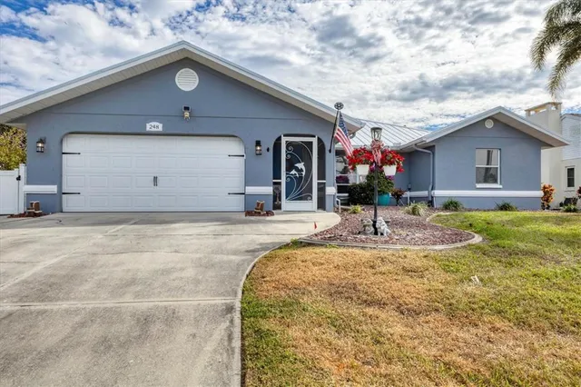 a view of a house with a yard