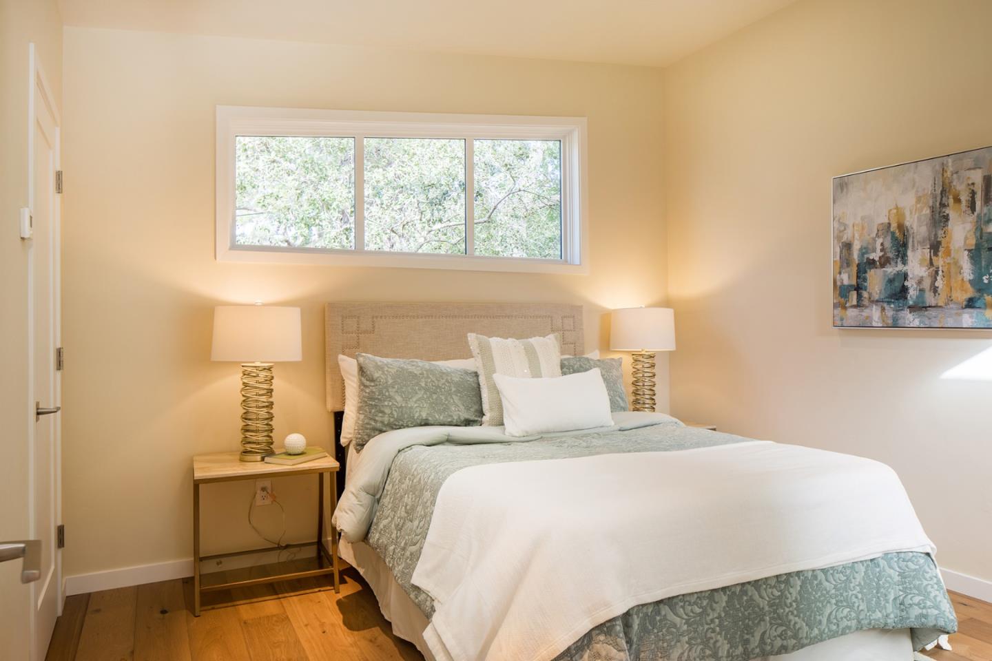 0 Forest & 8th Avenue Corner Carmel, CA 93923 - Photo 12 of 21 a bedroom with a bed and window