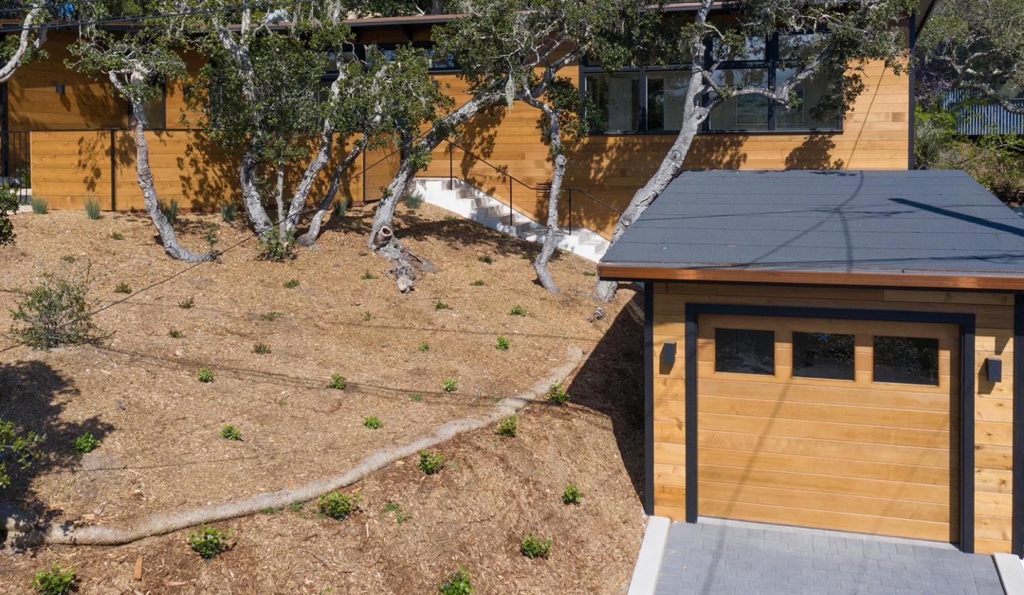 0 Forest & 8th Avenue Corner Carmel, CA 93923 - Photo 19 of 21 a backyard of a house with large trees