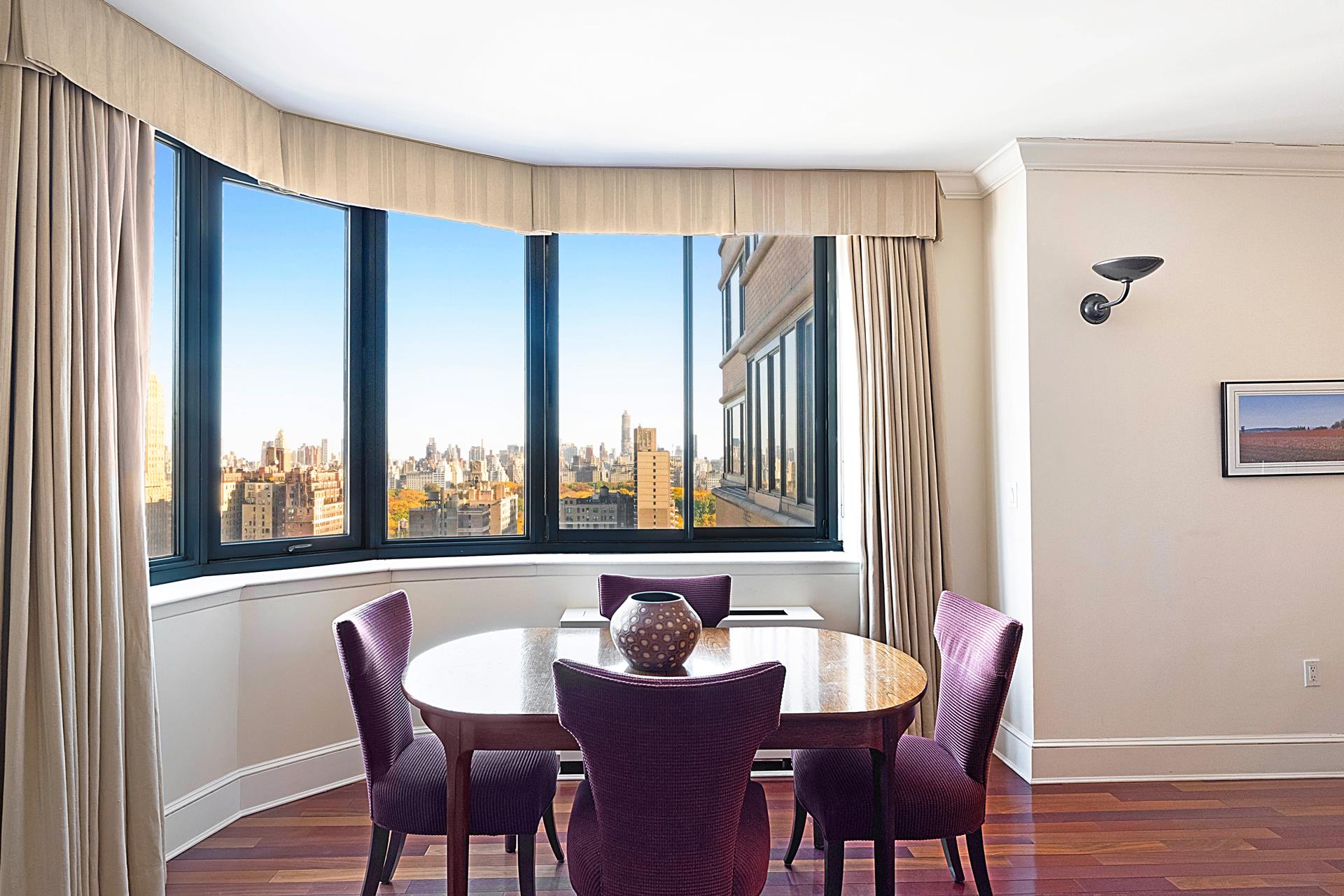 2000 Broadway, Unit 24A Manhattan, NY 10023 - Photo 1 of 1 a view of a dining room with furniture window and outside view