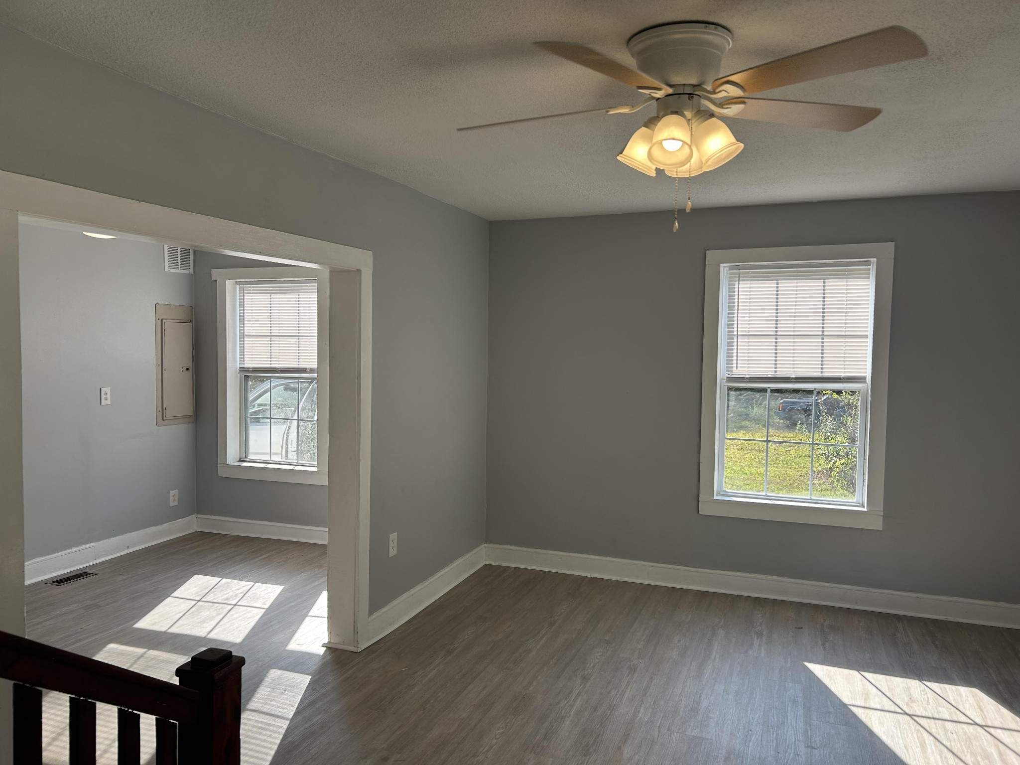 95 Front Street Stewart, TN 37175 - Photo 18 of 31 a view of an empty room with a window and wooden floor