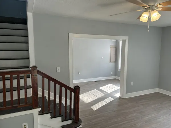 a view of staircase with a window