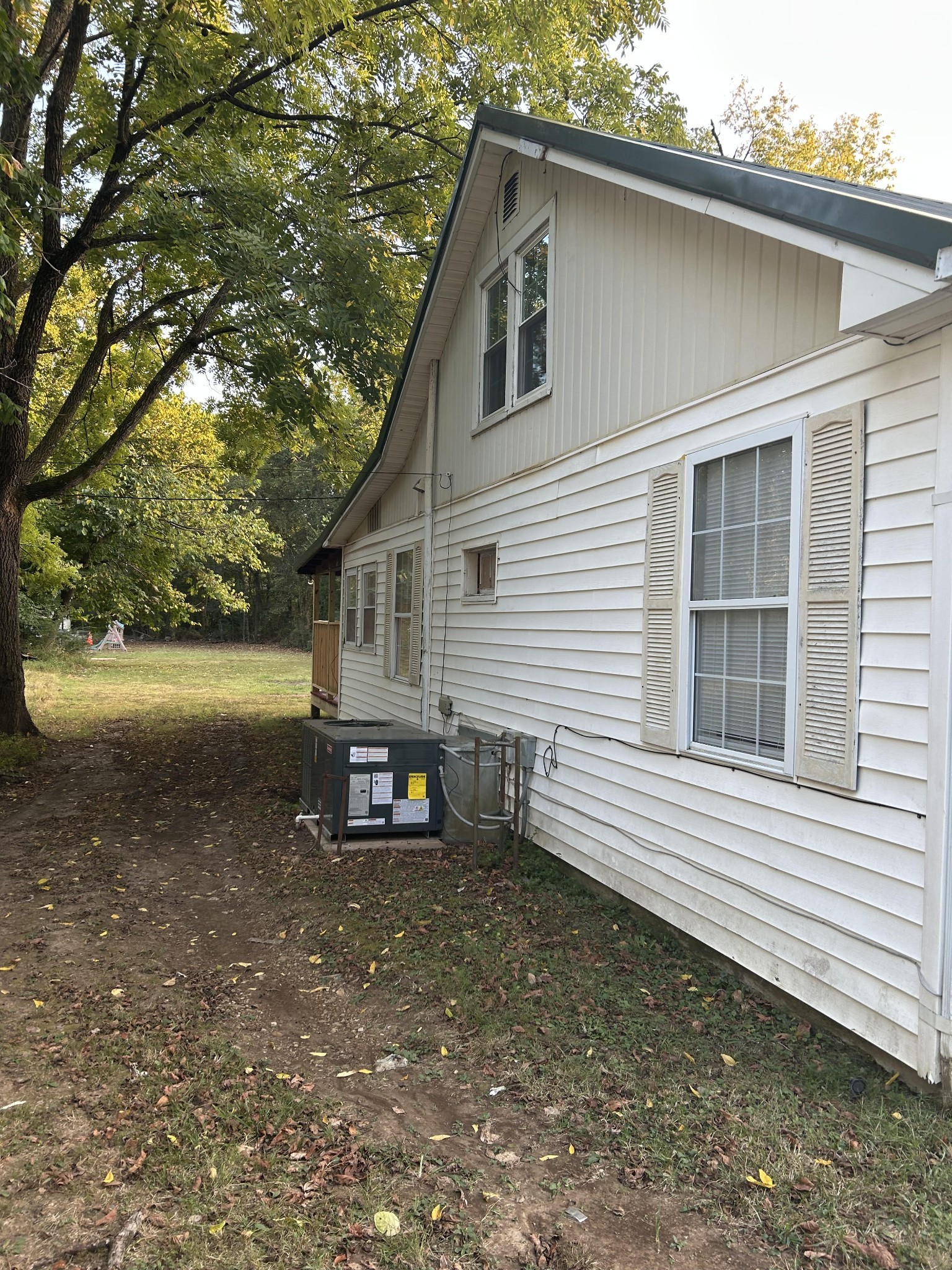95 Front Street Stewart, TN 37175 - Photo 7 of 31 a view of a small house with yard