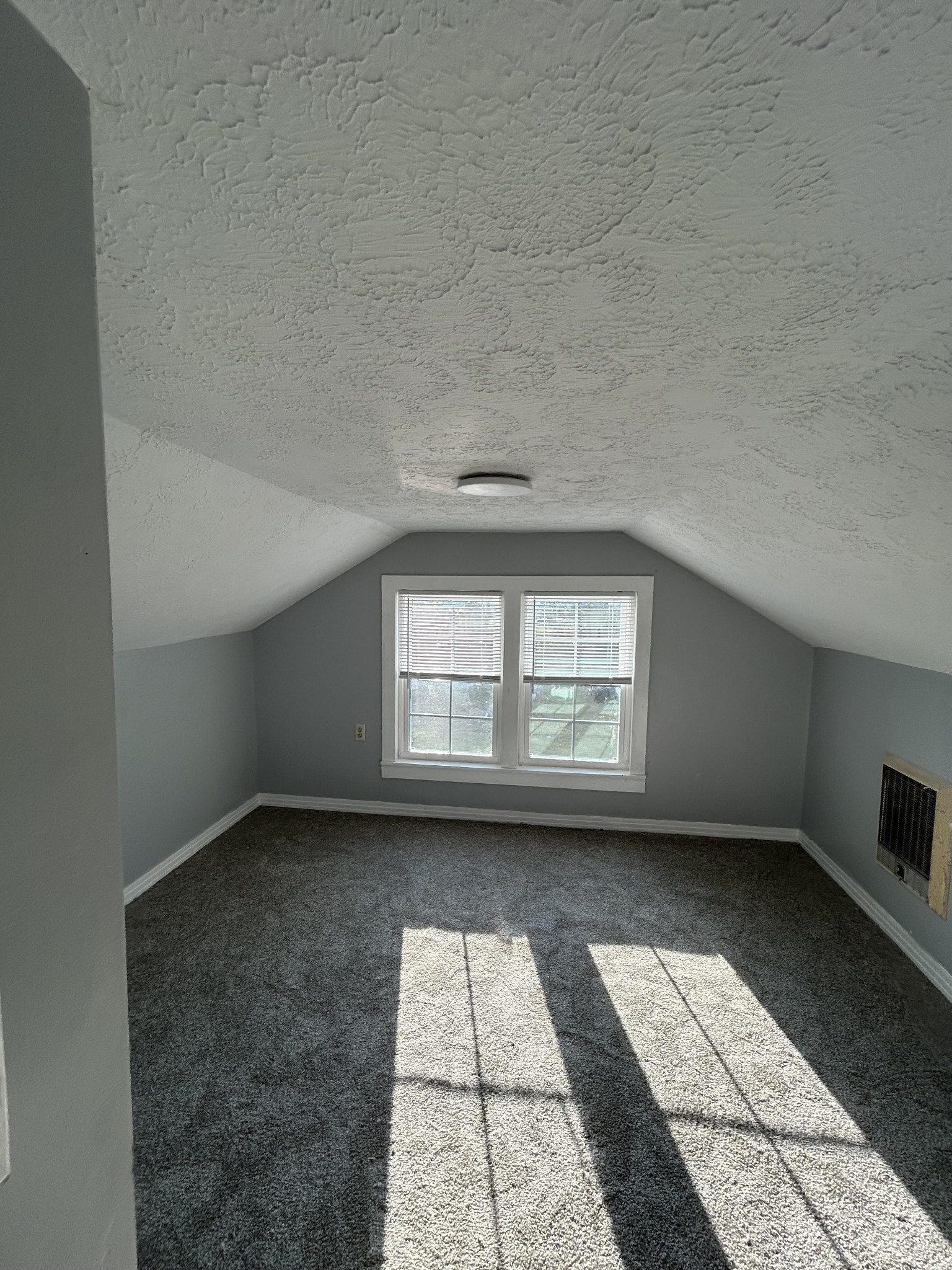 95 Front Street Stewart, TN 37175 - Photo 10 of 31 an empty room with a empty space and windows