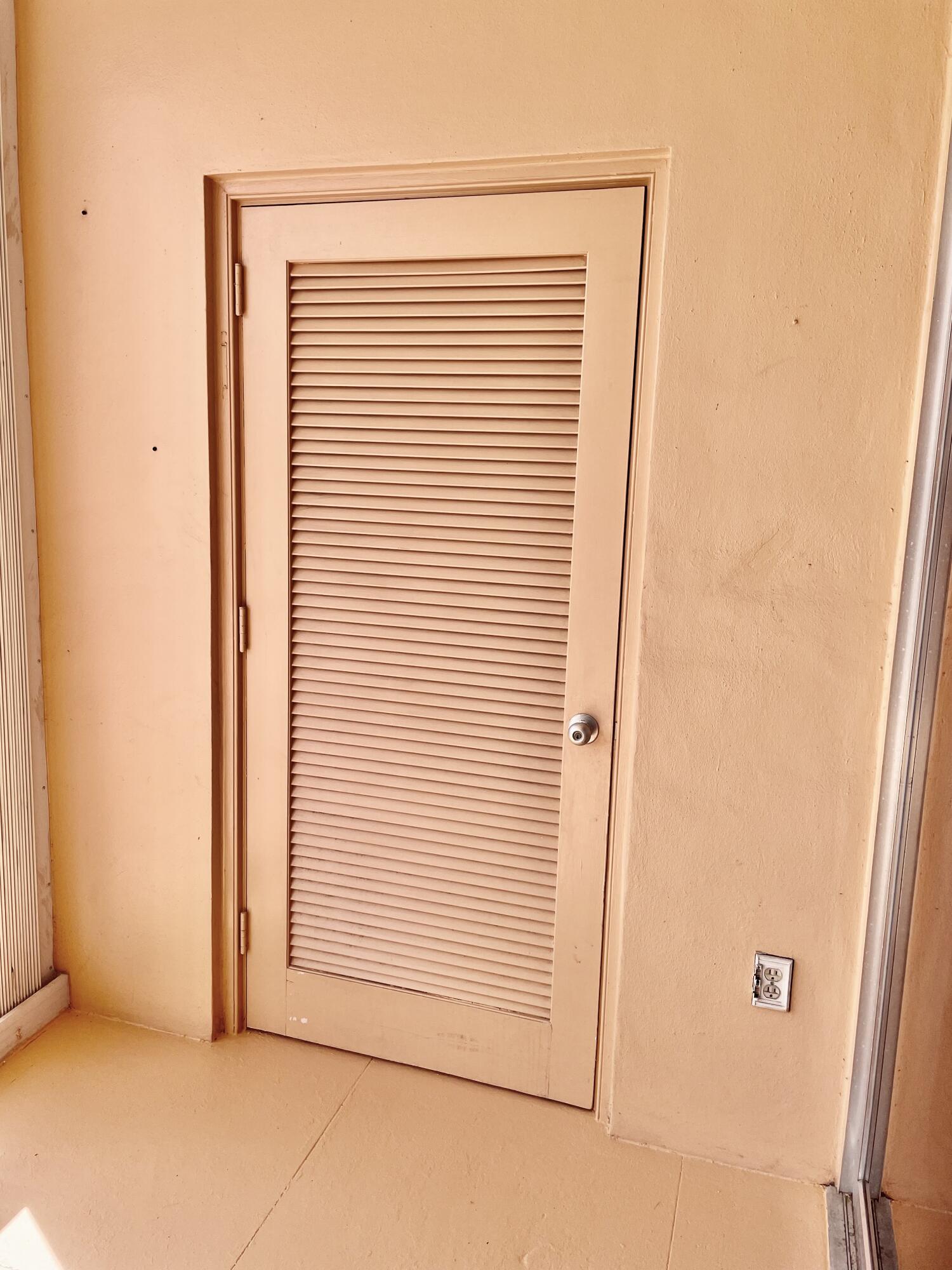 15 South Golfview Road, Unit 403 Lake Worth Beach, FL 33460 - Photo 30 of 32 a view of a small space with closet
