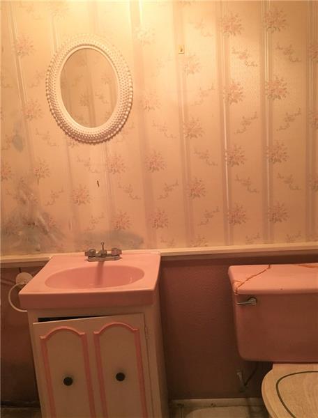 200 Olympic Road Pittsburgh, PA 15236 - Photo 21 of 25 Lower level, half bath awaiting a quick face lift.
