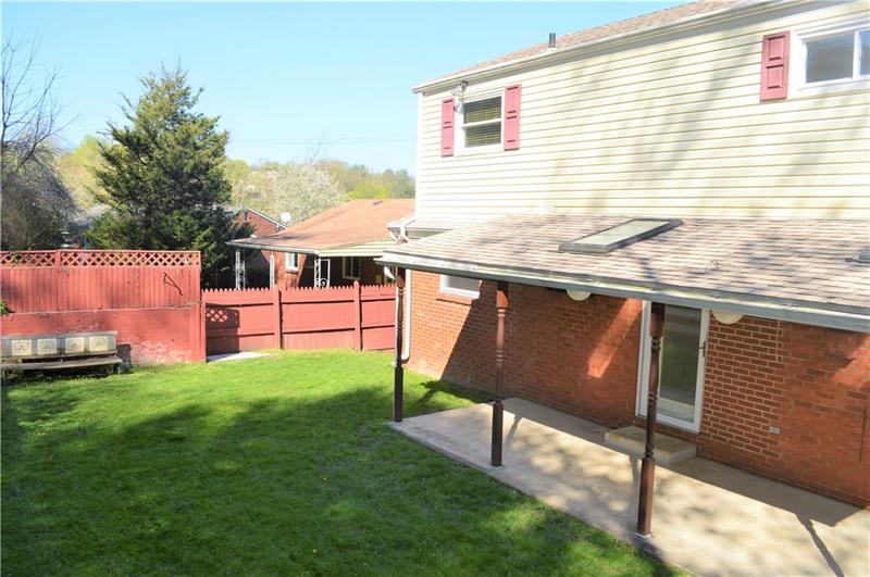 200 Olympic Road Pittsburgh, PA 15236 - Photo 24 of 25 Flat back yard with a covered patio, perfect for entertaining.