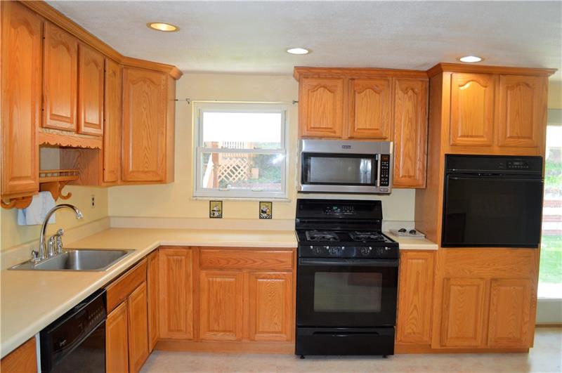 200 Olympic Road Pittsburgh, PA 15236 - Photo 5 of 25 Plenty of storage, counter top space and natural light in this newly remodeled kitchen.