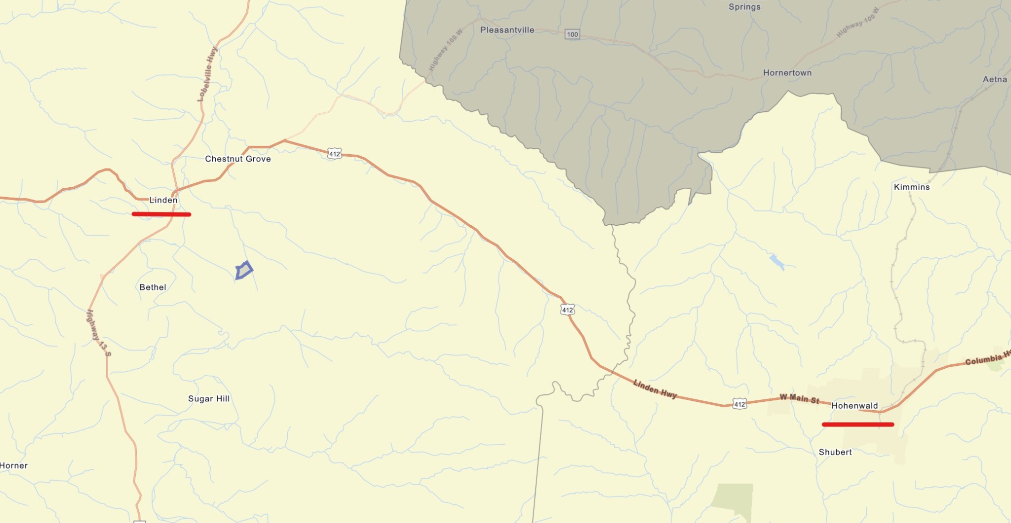 3149 Mcgee Road Linden, TN 37096 - Photo 10 of 18 a white house with a large tree in front of it