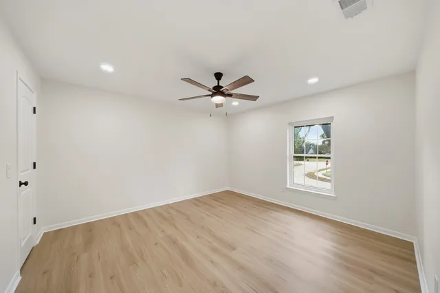 a bathroom with 2 sink and a mirror