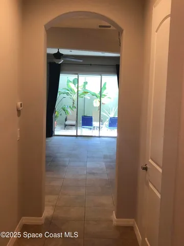 a view of a glass door and an entryway