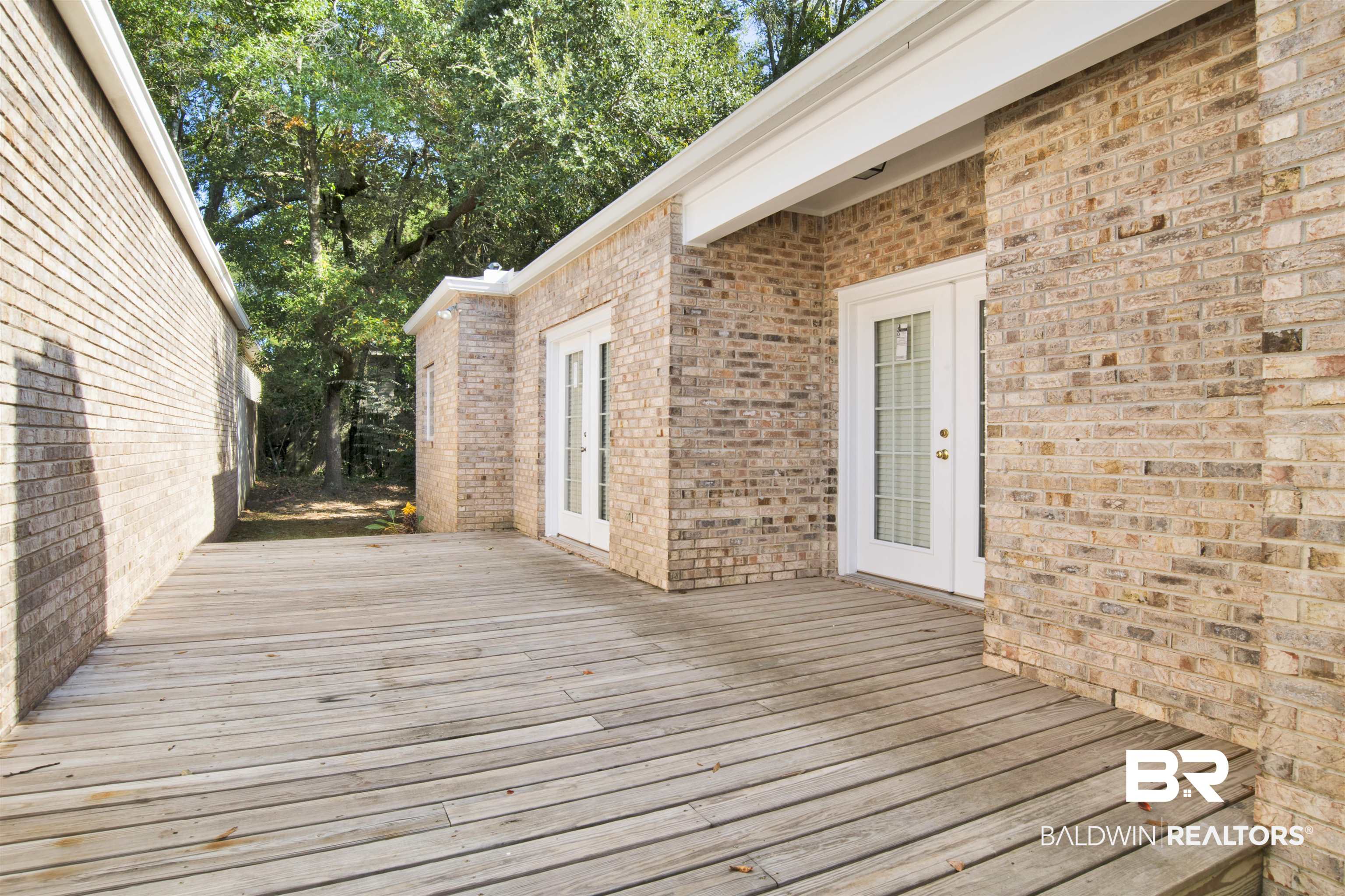 125 Woodruff Court Mobile, AL 36608 - Photo 23 of 27 Wooden deck with french doors