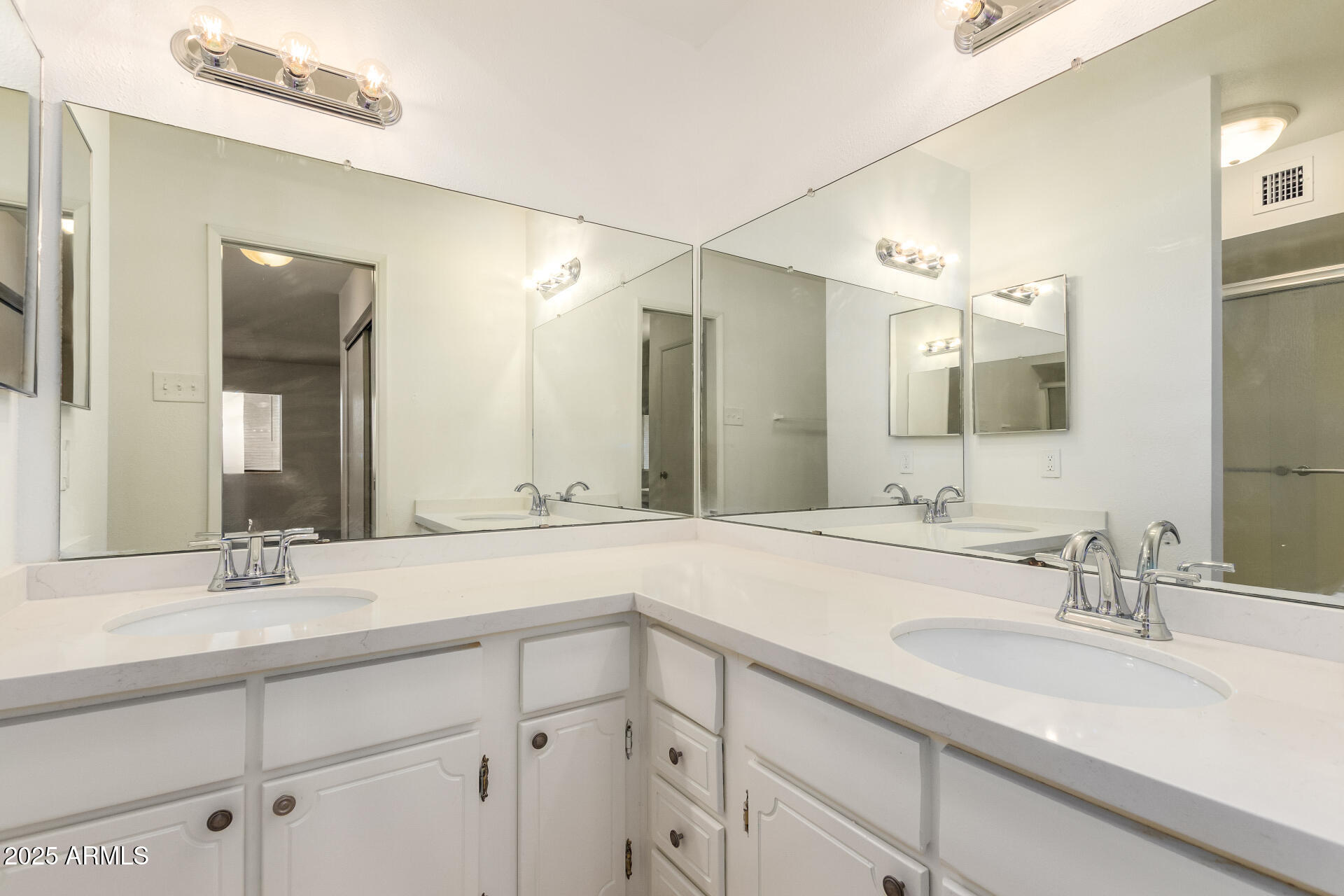 2128 East Villa Court Tempe, AZ 85282 - Photo 20 of 32 a bathroom with a sink and a mirror