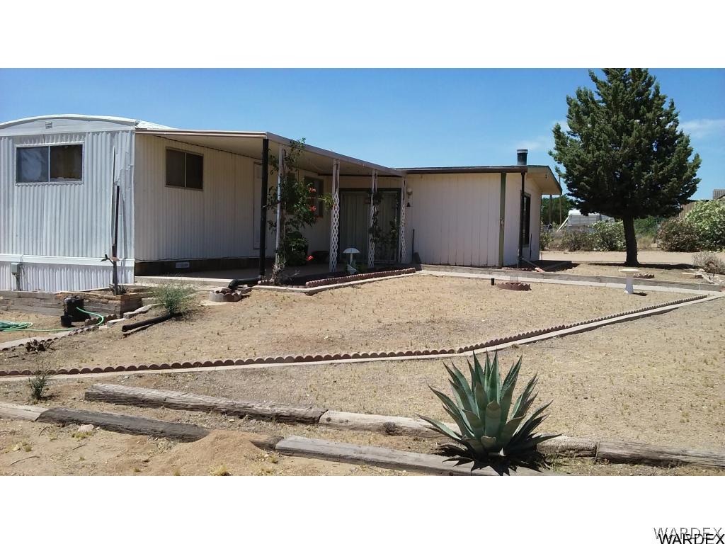 3681 Bosque Road Golden Valley, AZ 86413 - Photo 3 of 17 a view of a house with a outdoor space