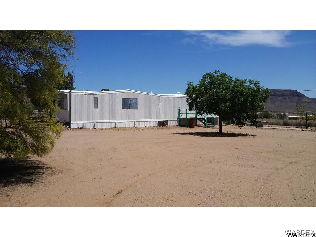 3681 Bosque Road Golden Valley, AZ 86413 - Photo 4 of 17 a black and white photo of a house